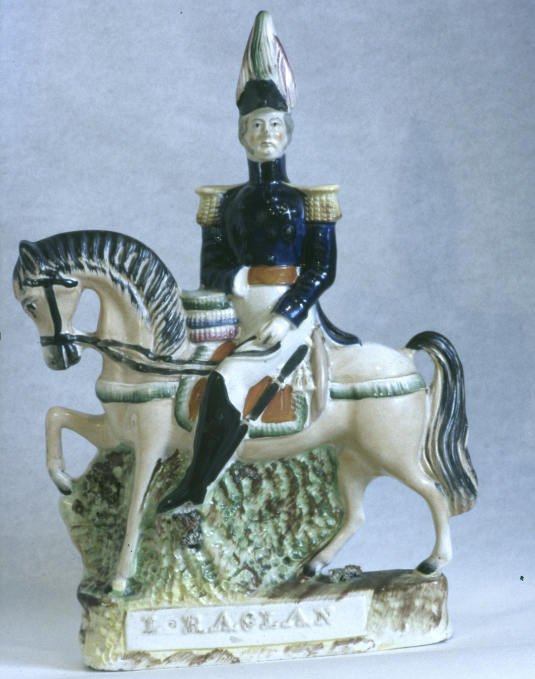Pottery figure on a horse